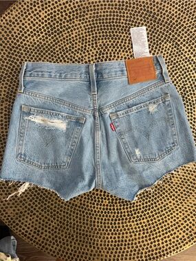 Women’s Levi's Light Blue Relaxed Fit Distressed shorts size 25